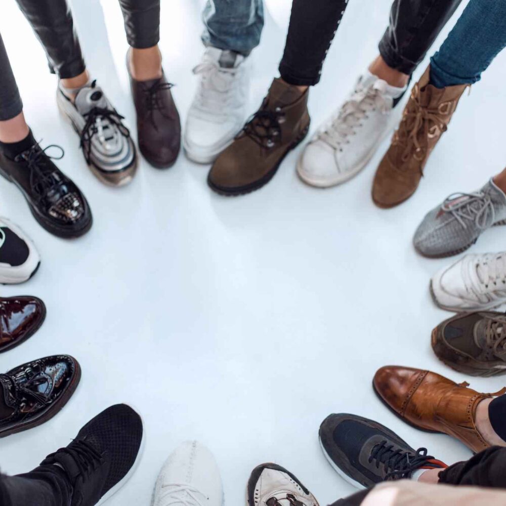 Group of youngsters wearing different types of shoes