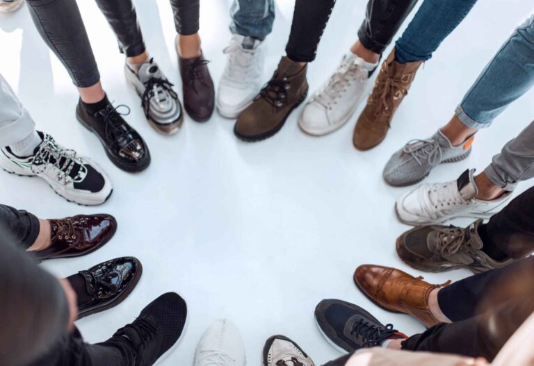 Group of youngsters wearing different types of shoes