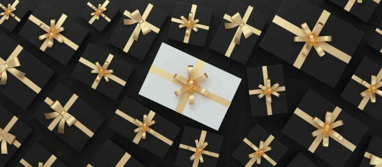 christmas gifts with one highlight white top view