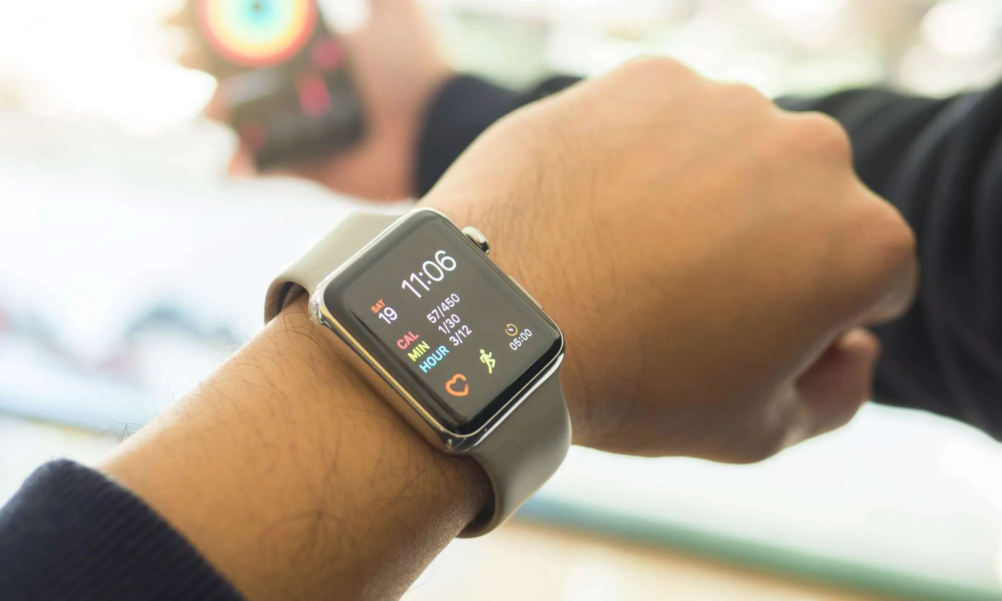Man wearing smart watch activity app smart phone