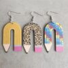 different varieties of pencil earrings