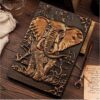 elephant vintage diary with pen kept on the table elephant vintage diary with pen kept on the table