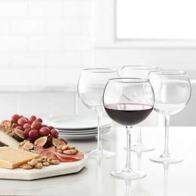 Red Wine Balloon Wine Glasses set with cheese board items on the table