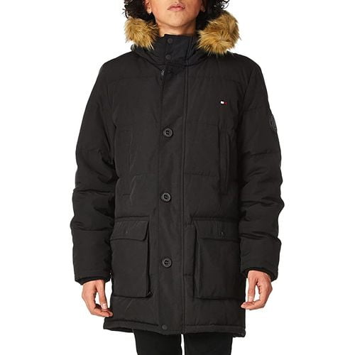 Woman wearing Parka long jacket attached the fur style hoodie Woman wearing Parka long jacket attached the fur style hoodie