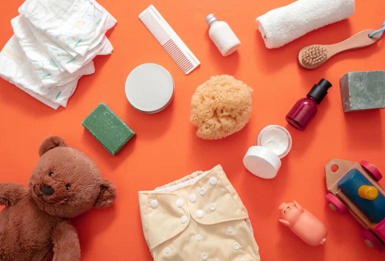 baby bathing diaper changing products background top view