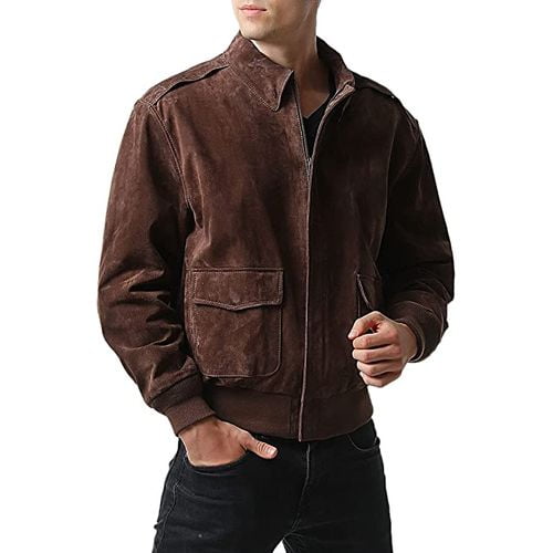 man wearing brown leather jacket holding his fingers in black pant pocket