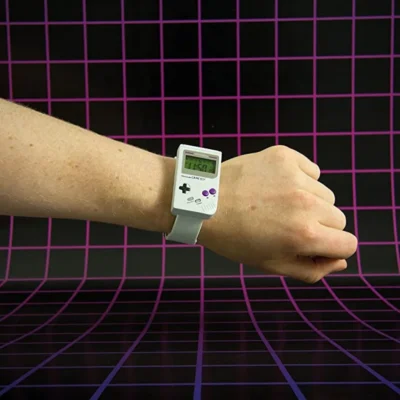 A man wearing nintendo gameboy watch