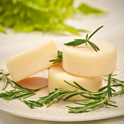 High quality photo of Organic dishwasher soap bar decorated with rosemary herbs