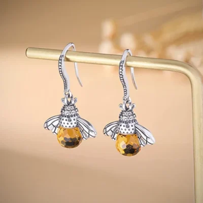 HoneyBee Crystal Earrings hanged in a hanger 21