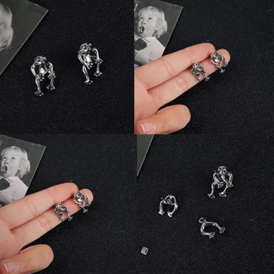 Woman keeps Frog Earring in Her Fingers 8