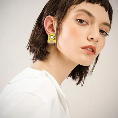 Young Girl With Short Hair Wearing School Bus Earring 22