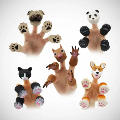 human wearing small dog puppet cat puppet bear puppet toys in hands human wearing small dog puppet cat puppet bear puppet toys in hands