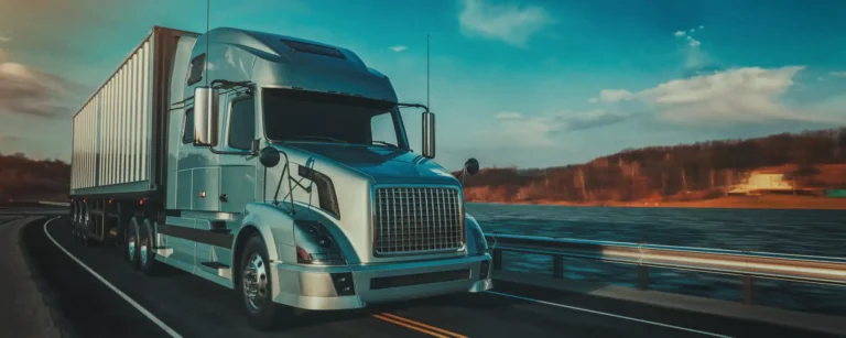 blue semi truck running on the road