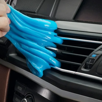 man cleaning car with cleaning gel